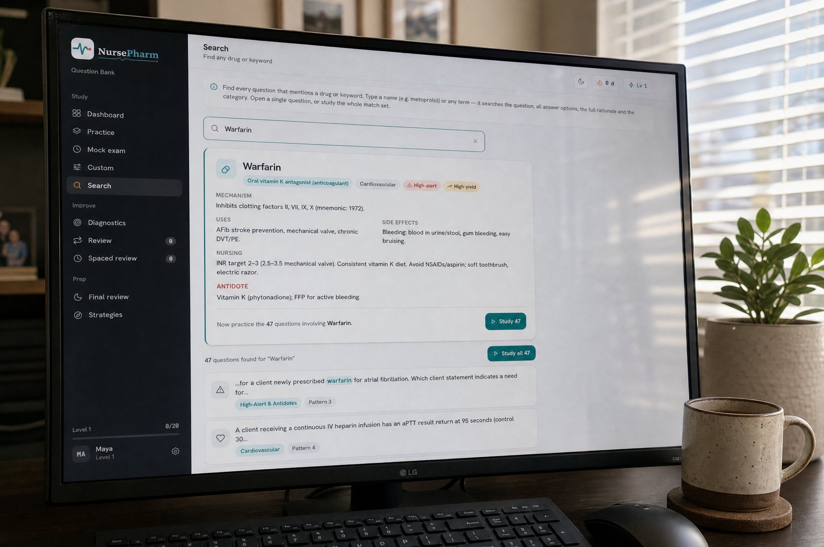 The study platform open on a desktop monitor, showing the searchable drug reference for warfarin.